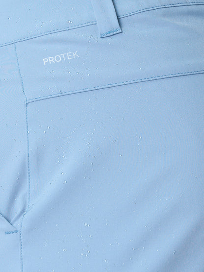 Close-up of sky blue Golf Club Shorts fabric with water droplets to highlight ProTek water resistance