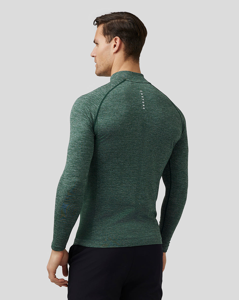 Back view of male model wearing pine grey body mapped seamless quarter zip top with stand collar.
