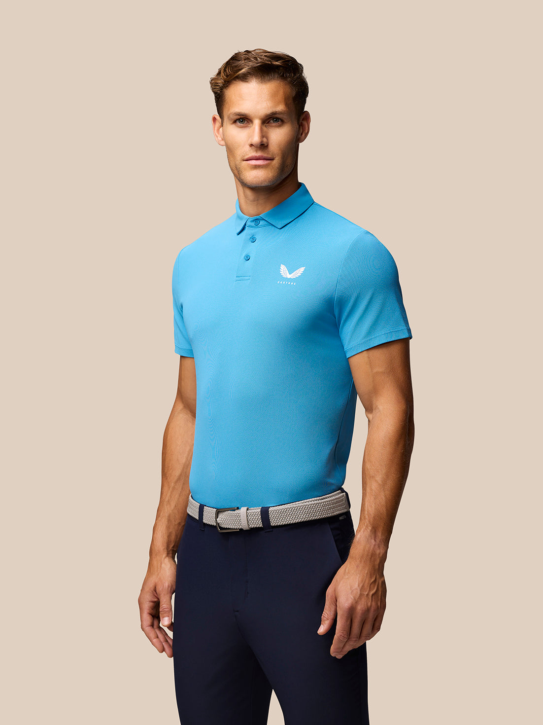 Male model wearing Corn Blue Club Golf Polo with a pointed collar and three-button placket