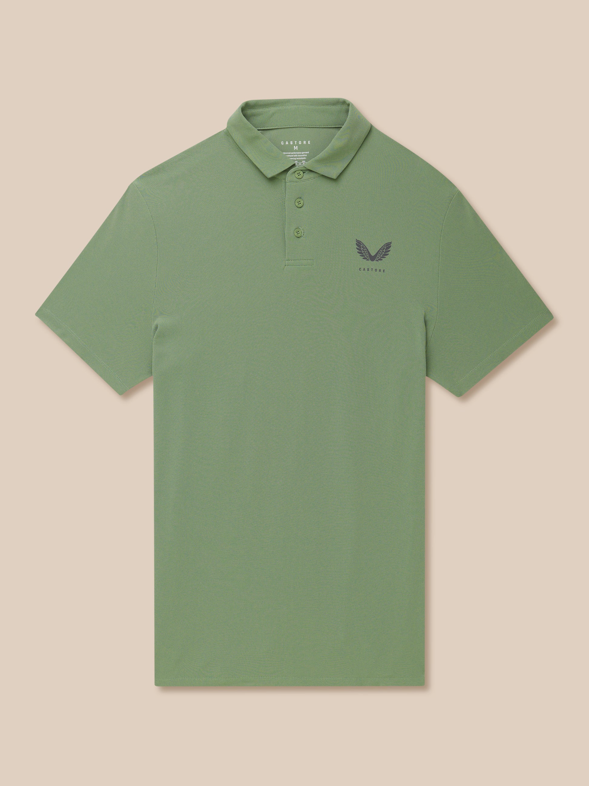 Close-up of olive green Golf Club Essential Polo showing collar and left chest logo.