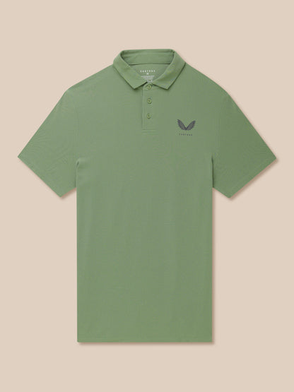 Close-up of olive green Golf Club Essential Polo showing collar and left chest logo.
