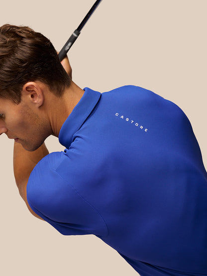 Close up of royal blue Club Golf Polo with Castore logo on the chest.