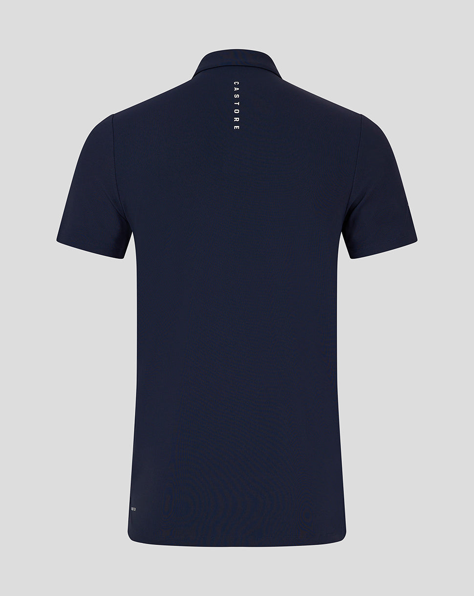 Back view of navy Club Essential Polo with vertical CASTORE lettering along the upper back