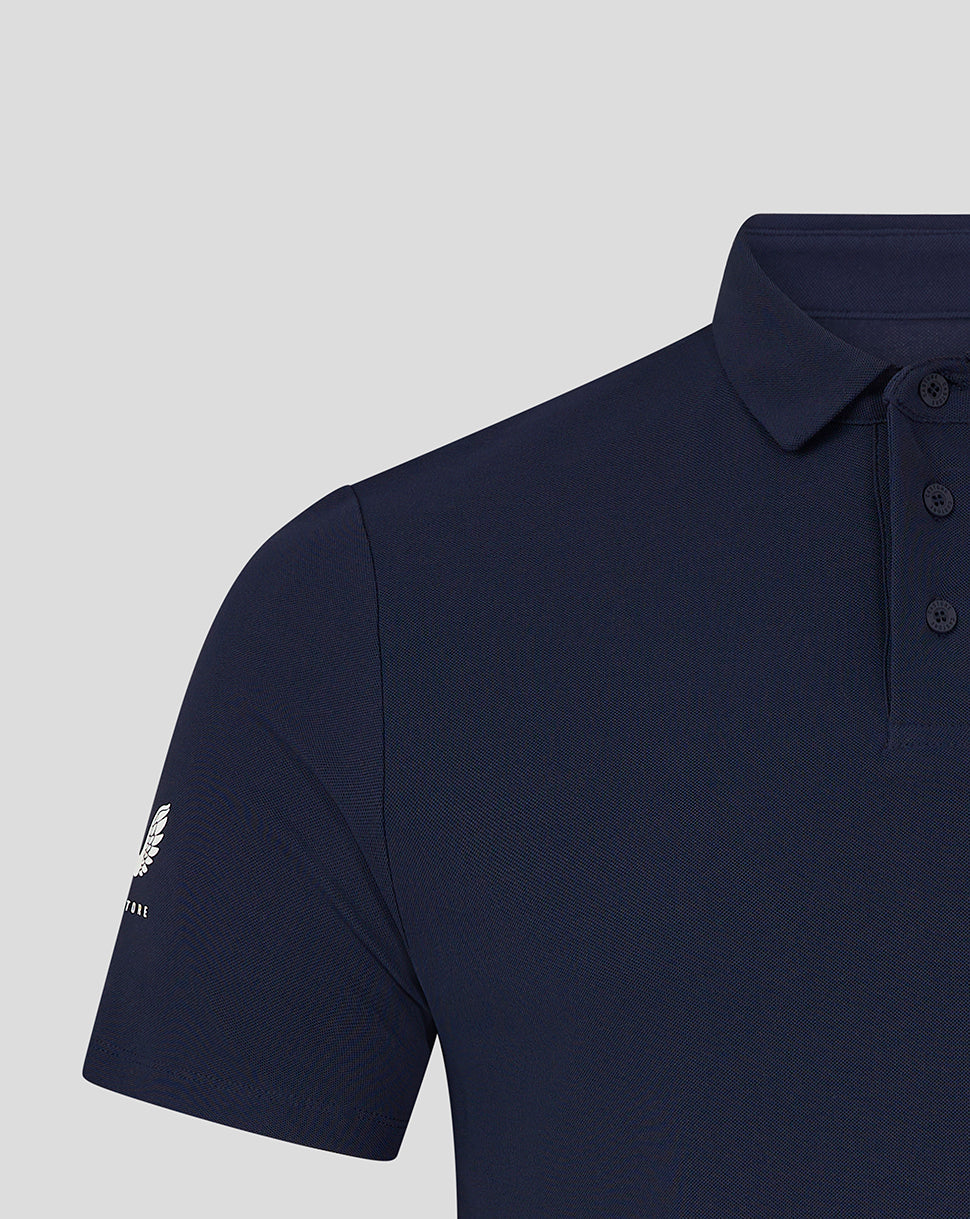 Close-up of navy Club Essential Polo collar and three-button placket in textured piqué fabric