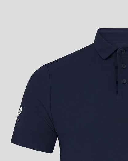 Close-up of navy Club Essential Polo collar and three-button placket in textured piqué fabric