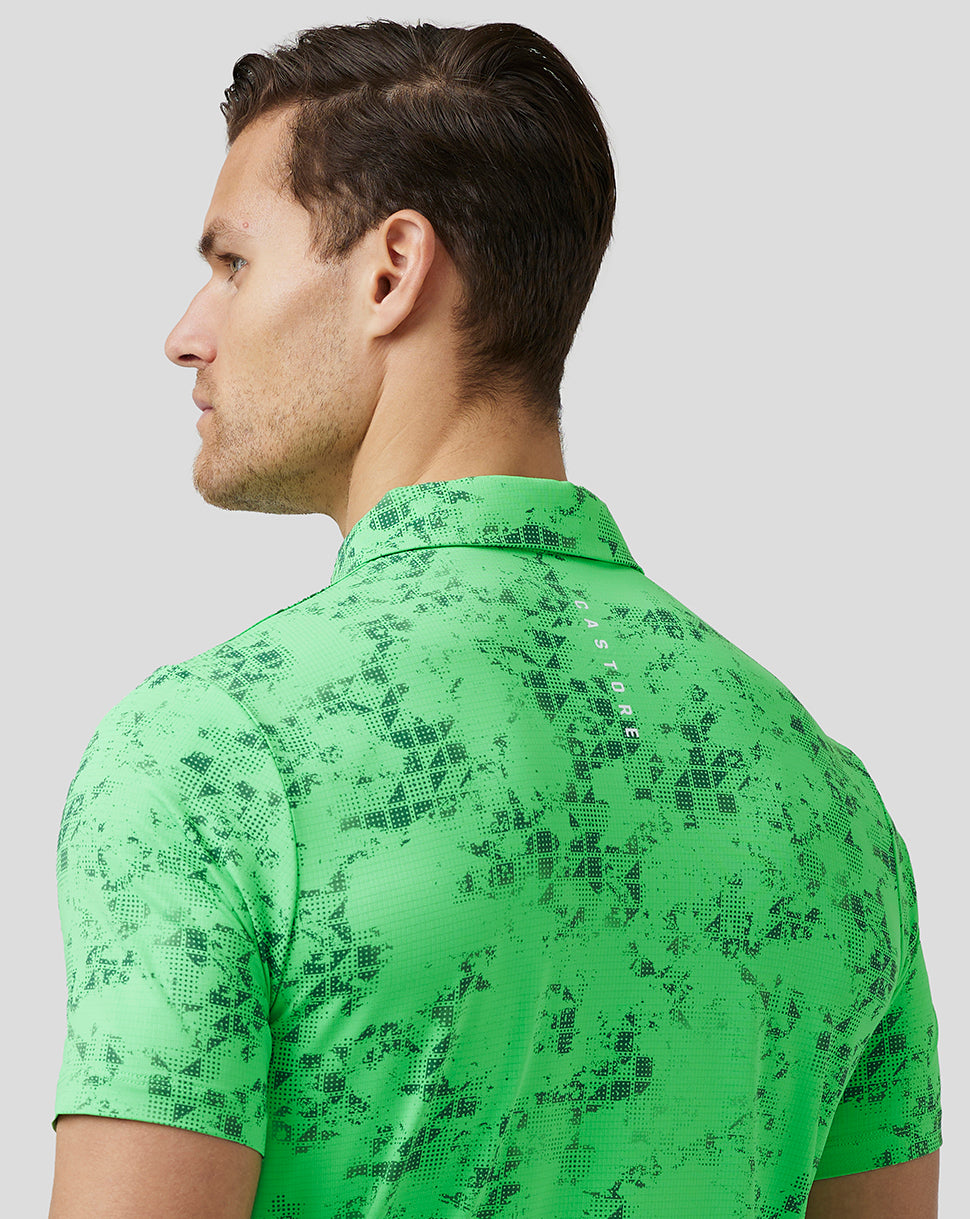 Back view of lime geo printed golf polo with Castore branding down the back