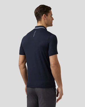 Back view of navy Men’s Golf Tech Polo with Castore branding along the upper back.