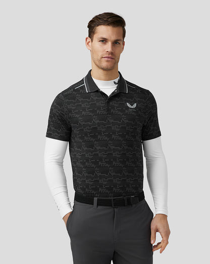 Front view of a man wearing a black printed golf polo with pixel pattern and Castore logo on left chest