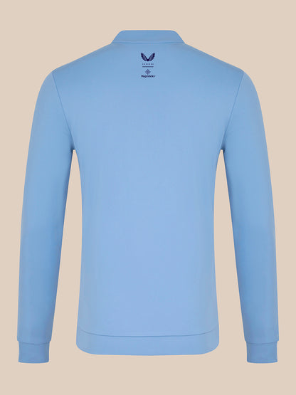 Back view of sky blue Majesticks ¼ Zip Top with Castore and Majesticks logos at the upper back.