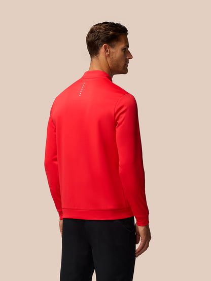 Back view of poppy red Golf Club Classic 1/4 Zip Top with Castore branding on upper back