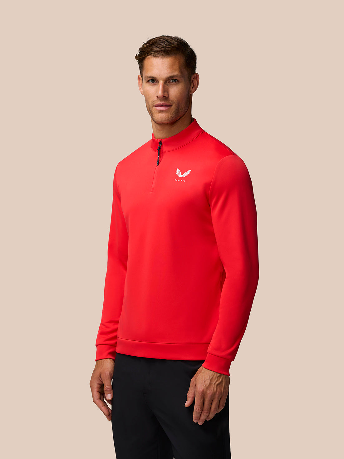Front view of poppy red Golf Club Classic 1/4 Zip Top with stand collar and center front zip, Castore logo on left chest