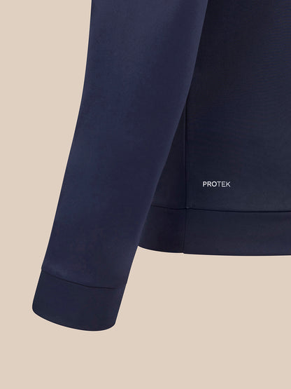 Back view of navy Majesticks quarter zip top with Protek branding at lower back