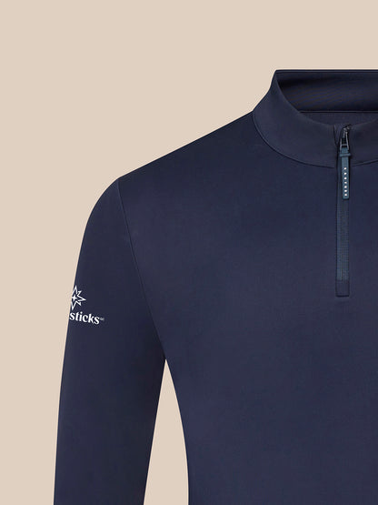 Close up of navy quarter zip golf top neckline with Castore branded zipper pull and Majesticks sleeve logo