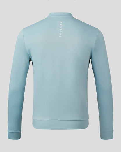 Back view of the Classic 1/4 Zip in stone blue with CASTORE vertical wordmark along the upper back.