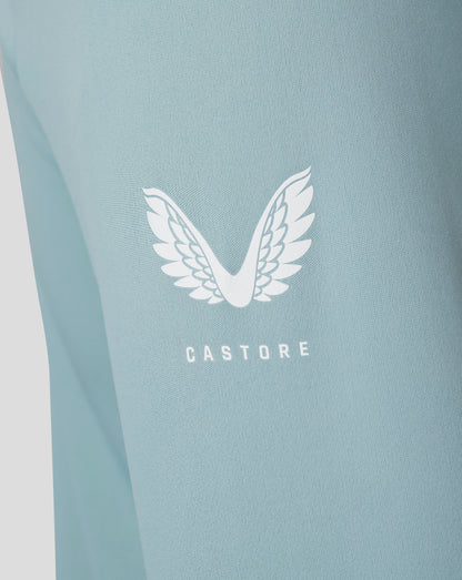Close-up of stone blue fabric from the Classic 1/4 Zip showing a white Castore wing logo.
