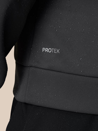 Close-up of dark Protek fabric with droplets showing water resistance.