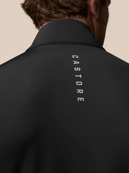 Back view close up of the black Pinnacle Gilet showing vertical CASTORE branding along the back of the collar.
