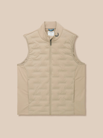 Beige Pinnacle Gilet upper torso with quilted panels and Castore emblem near the collar.