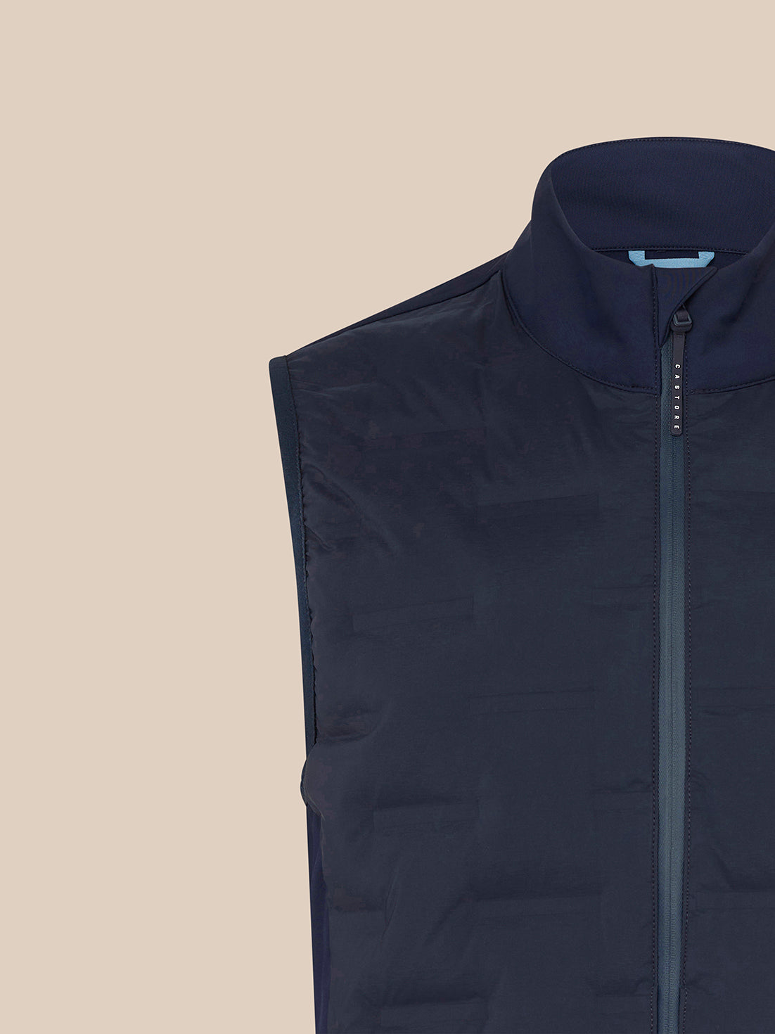 Close-up of navy Majesticks Hybrid Gilet front with center zipper and Majesticks logo on the chest
