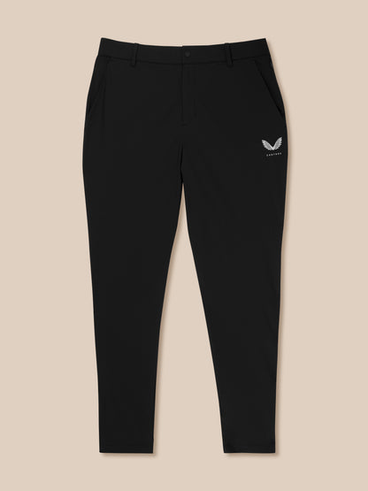 Full-length view of black Golf Pinnacle Trousers 32in leg showing Castore logo on the right thigh