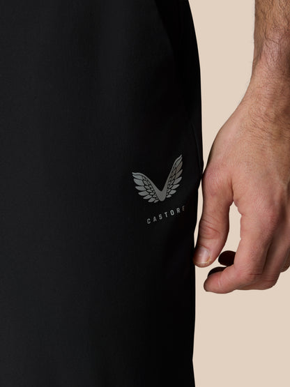 Back view of black Golf Pinnacle Trousers highlighting the Castore logo on the right thigh.