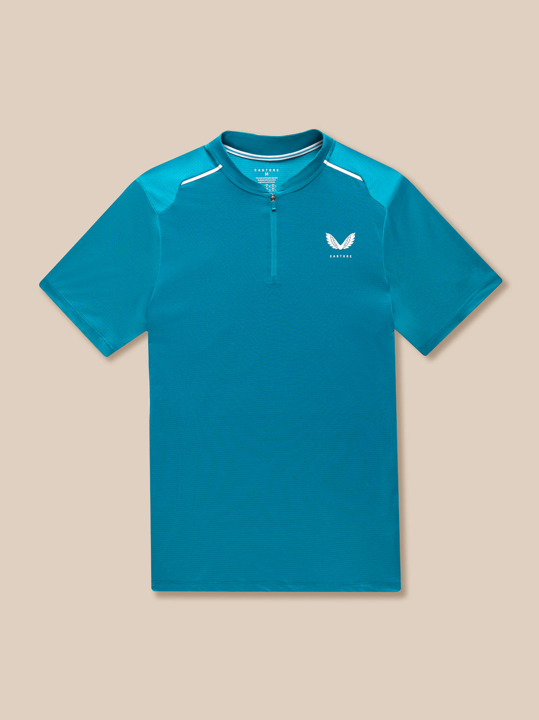 Front view of teal Pinnacle Varsity Polo laid flat showing quarter zip and Castore logo on left chest