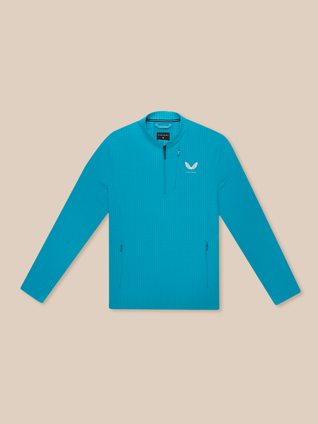 Blue golf 1/2 zip top with stand collar left chest and front pockets with water resistant zippers and Castore branding.