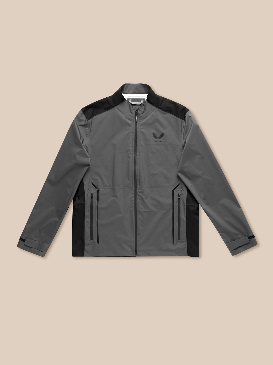 Flat front view of gunmetal two-tone golf waterproof jacket with front zip, zip pockets and Castore branding on chest