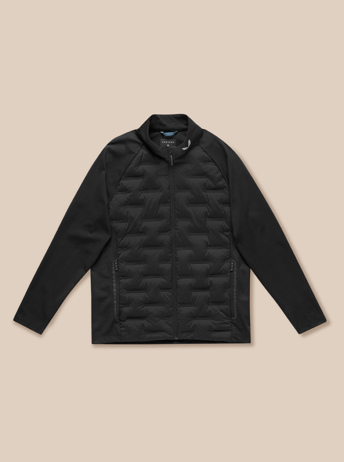 Full length view of man in black Pinnacle Golf Jacket with quilted front and zip pockets