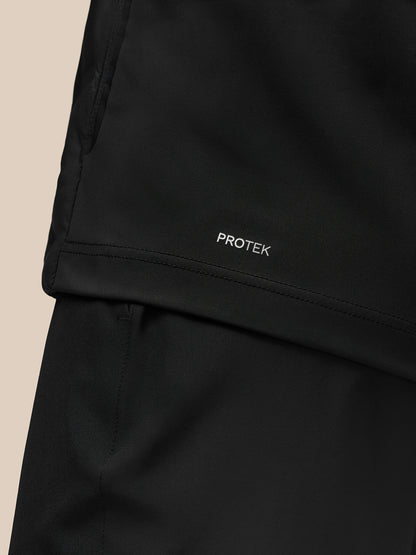 Close up of Protek fabric and logo at the jacket hem