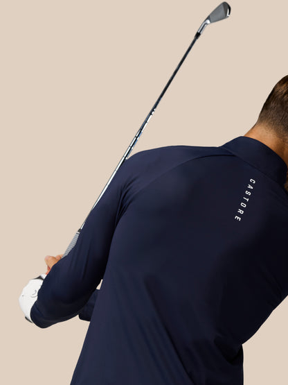 Back view of midnight navy Castore Golf Pinnacle Jacket showing branding along the shoulder area