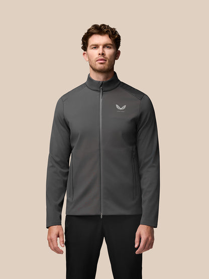 Male model wearing charcoal Garcia Hybrid Jacket with stand collar and front zip