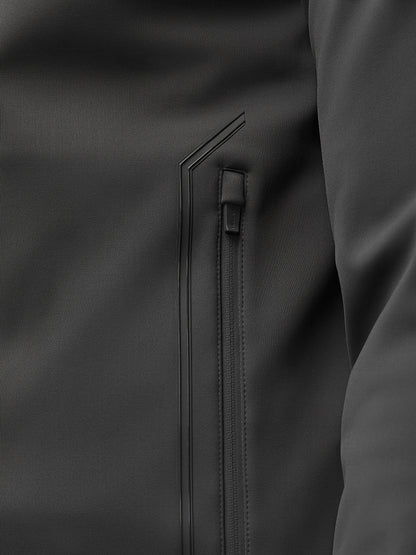 Close-up of charcoal Garcia Hybrid Jacket showing a water resistant zip pocket and seam detailing.