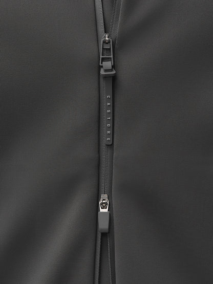 Close-up of a charcoal jacket zipper pull with CASTORE branding.