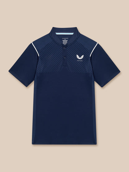 Close up of navy Pinnacle LVS Polo showing diagonal vent panels and white shoulder piping with logo.