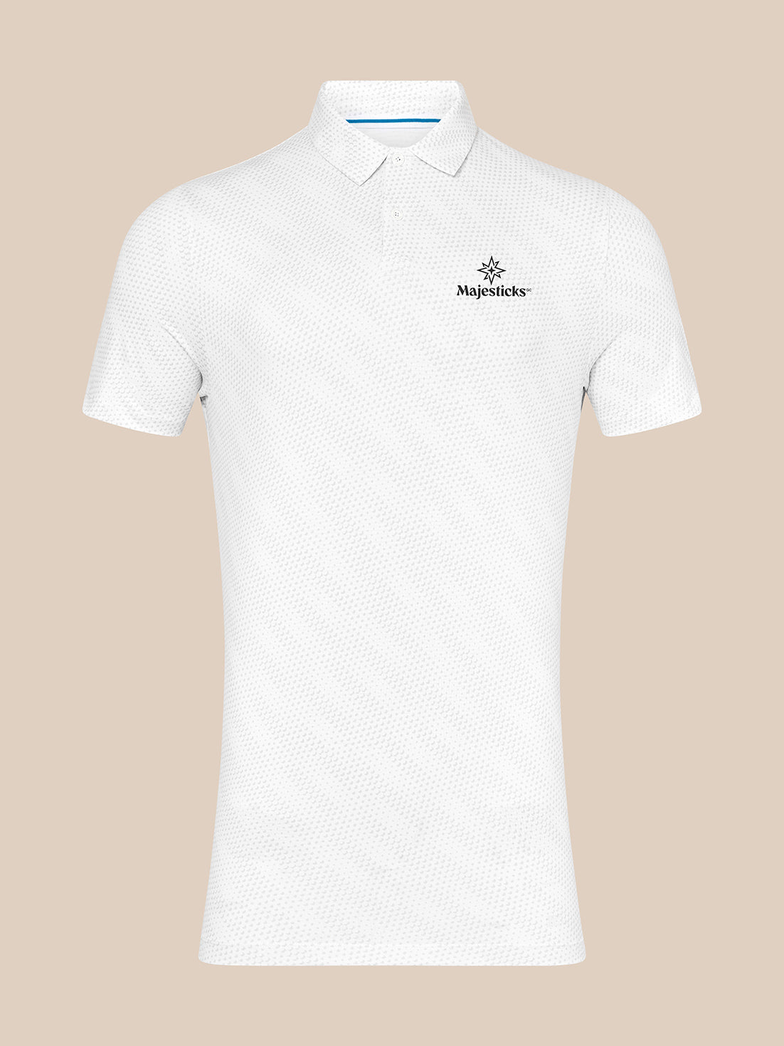 Front view of a white Majesticks polo with golf ball texture and a left chest logo