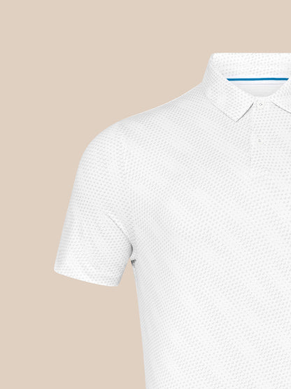 Close-up of shoulder and collar on white Majesticks polo with textured golf ball fabric