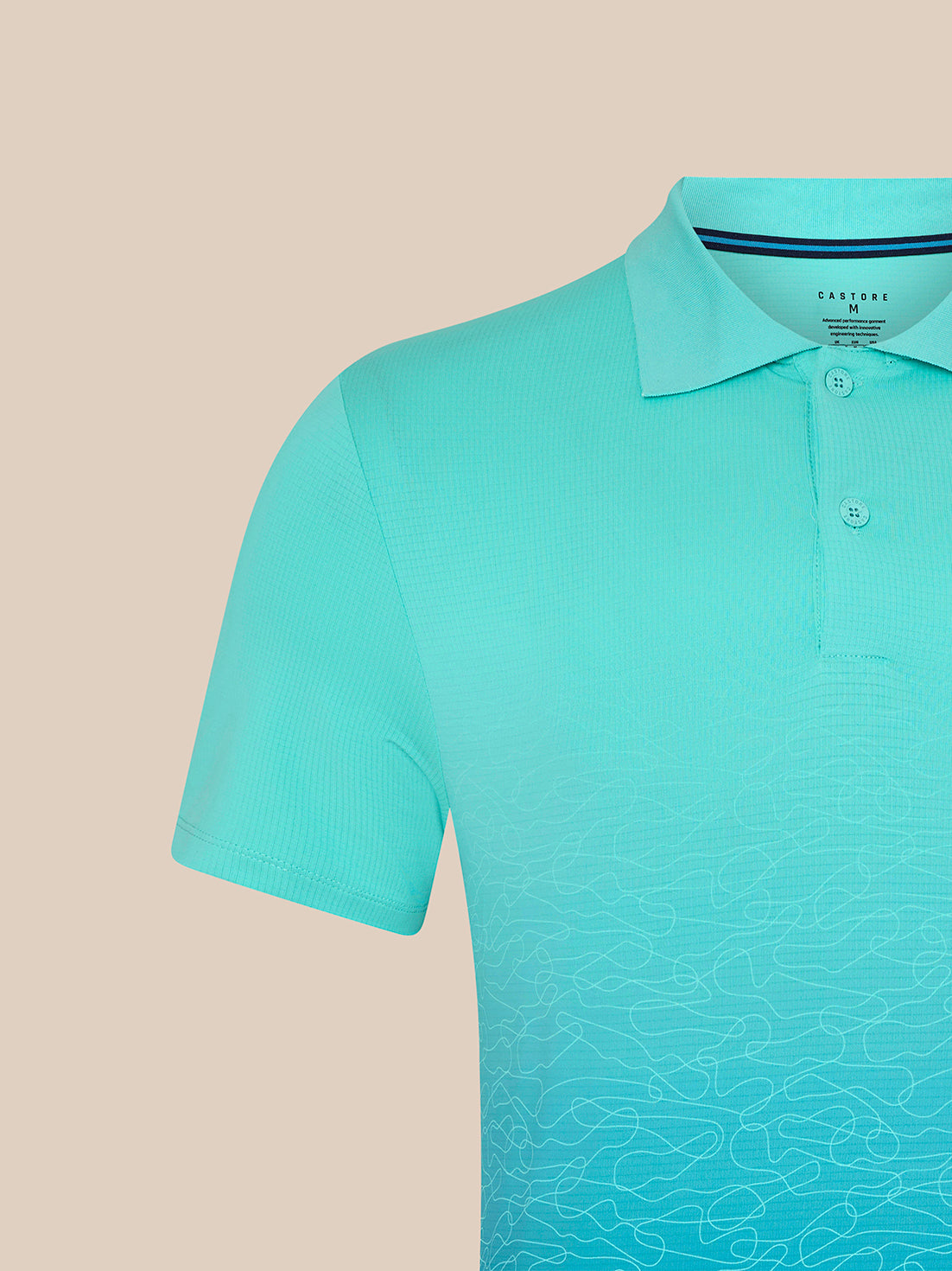 Close up of collar and upper body of light aqua Majesticks golf polo with ombre pattern