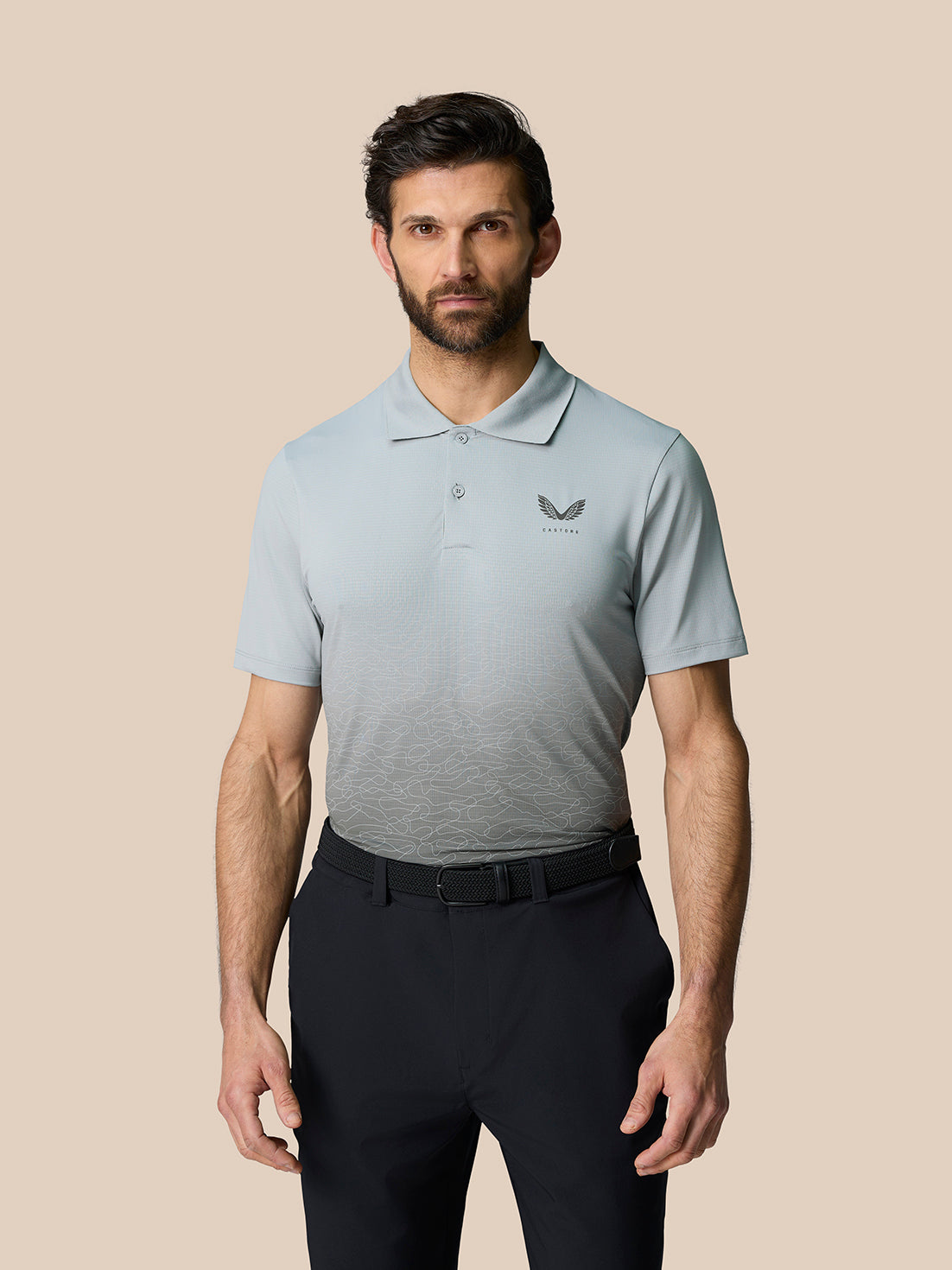Club Graphic Polo in mid grey with ombre chest print, short sleeves and stand collar; Castore branding on left chest.