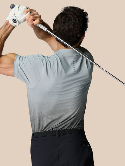 Back view of Club Graphic Polo in mid grey with subtle print and Castore branding on upper back.