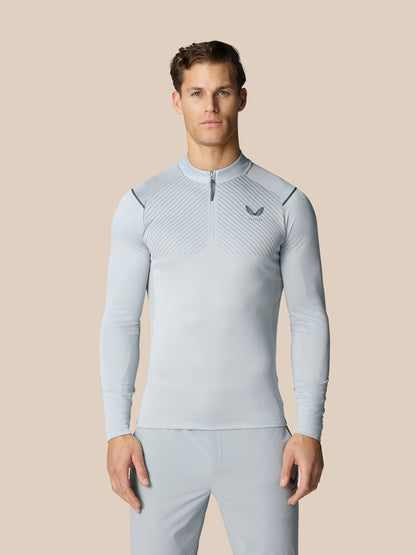 Men's light grey Pinnacle LVS quarter zip top with diagonal stripe pattern and Castore logo on left chest