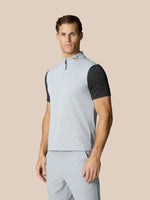 Male model wearing mid grey Golf Club Classic Half Zip Gilet with high neck and half zip