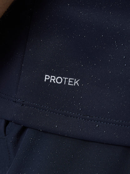 Close up of navy ProTek fabric with water droplets beading on the surface