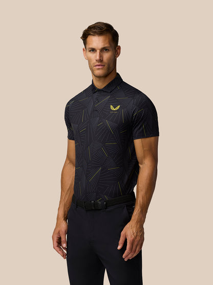 Male model wearing black Golf Club Swing Polo with a geometric line print and Castore logo on the left chest