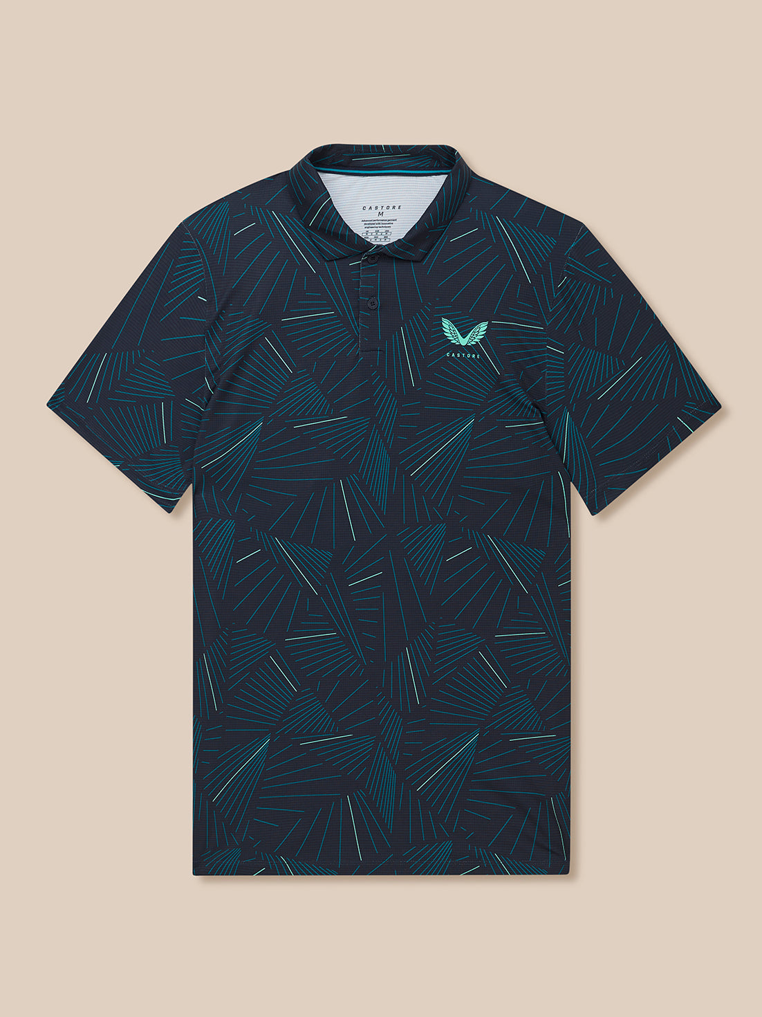 Front view of midnight navy polo with aqua geometric print and Castore logo on left chest.