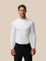 Male model wearing white Golf Club Long Sleeve Thermal Mock Neck top with subtle branding at neck