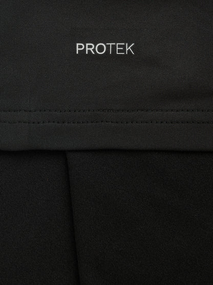 Close-up of black fabric with PROTEK branding and visible seam stitching