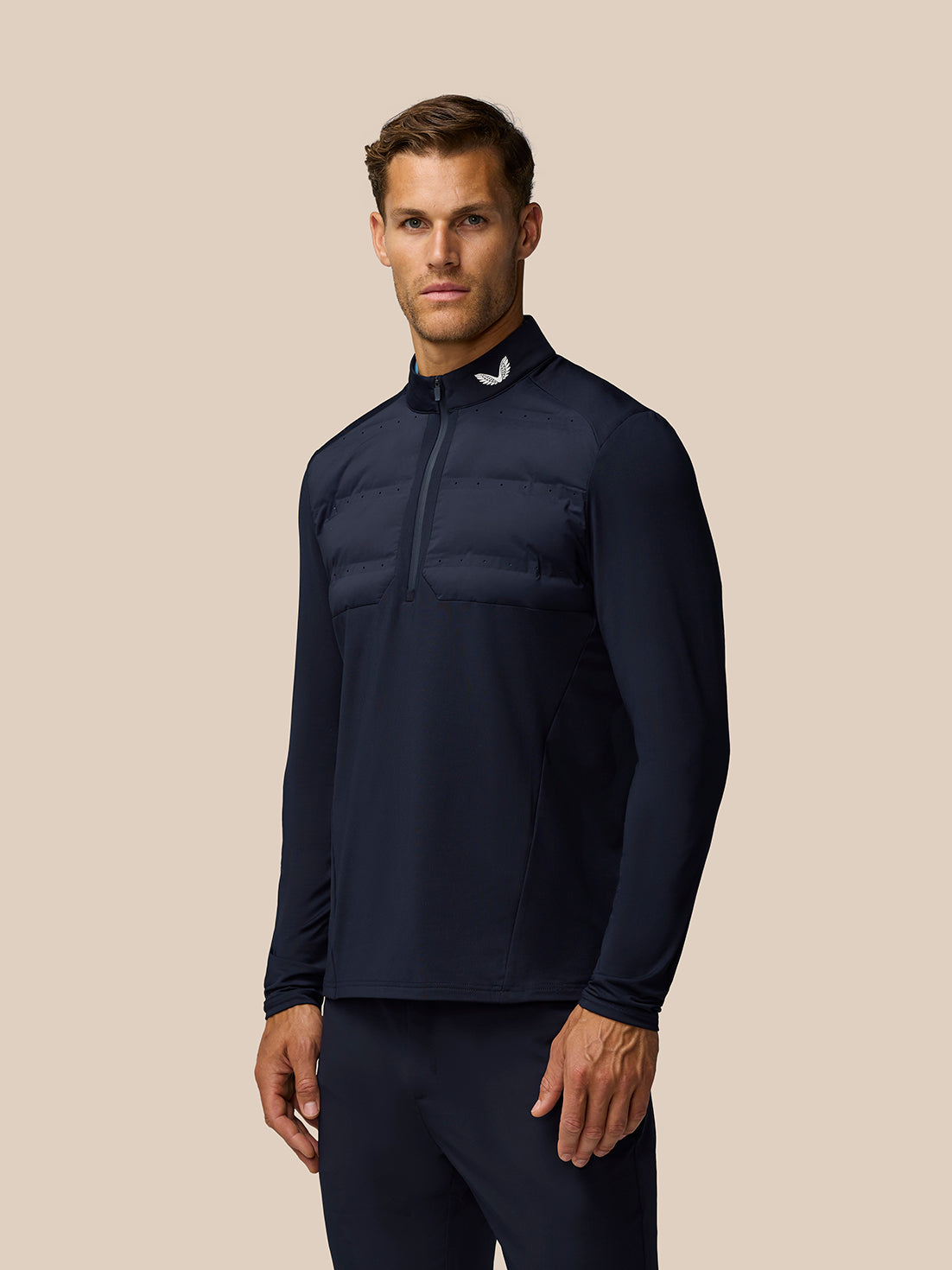 Back view of the LVS Hybrid 1/2 Zip Top in midnight navy showing back ventilation details and Castore branding at the neck