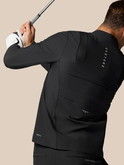 Back view of the black LVS jacket with a ribbed panel on the upper back and Protek branding near the hem.