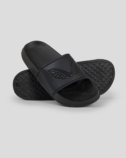 Angled view of a single black Castore slider with embossed wing emblem on the strap